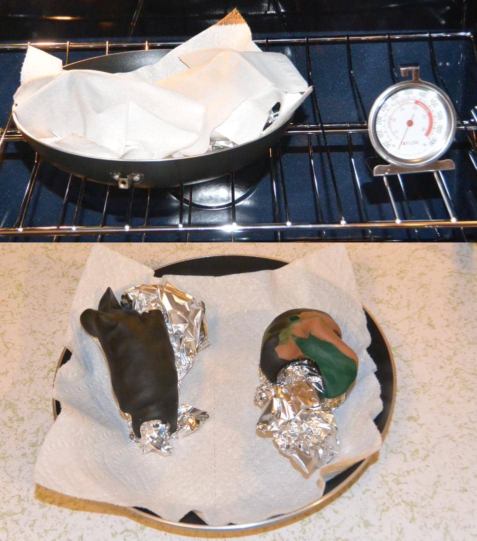 A couple of grips covered up in the oven after firing and uncovered sitting on their tin foil supports