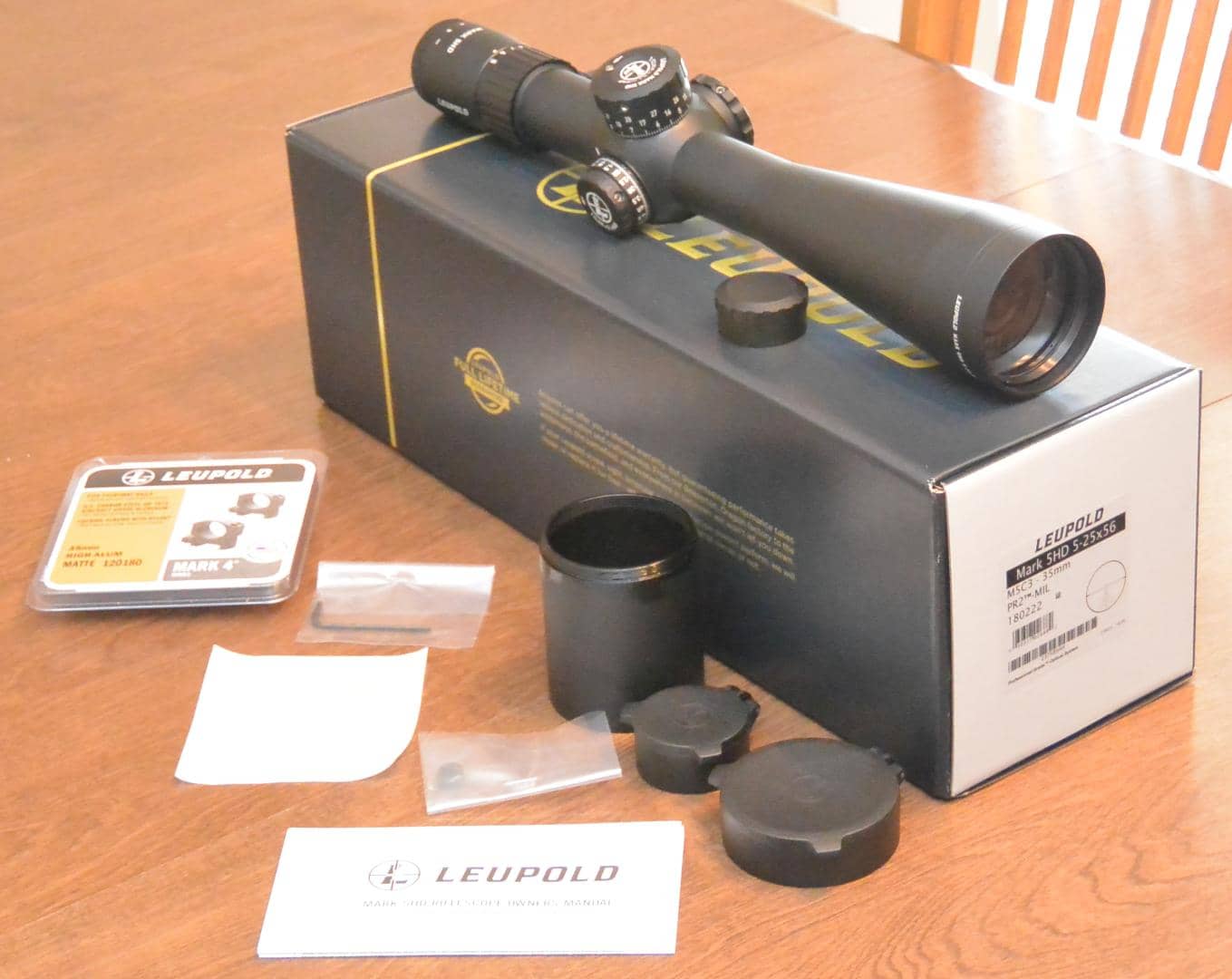 Leupold Mark 5HD 5-25x56 Unboxing showing included sunshade and flip caps (rings are not included)